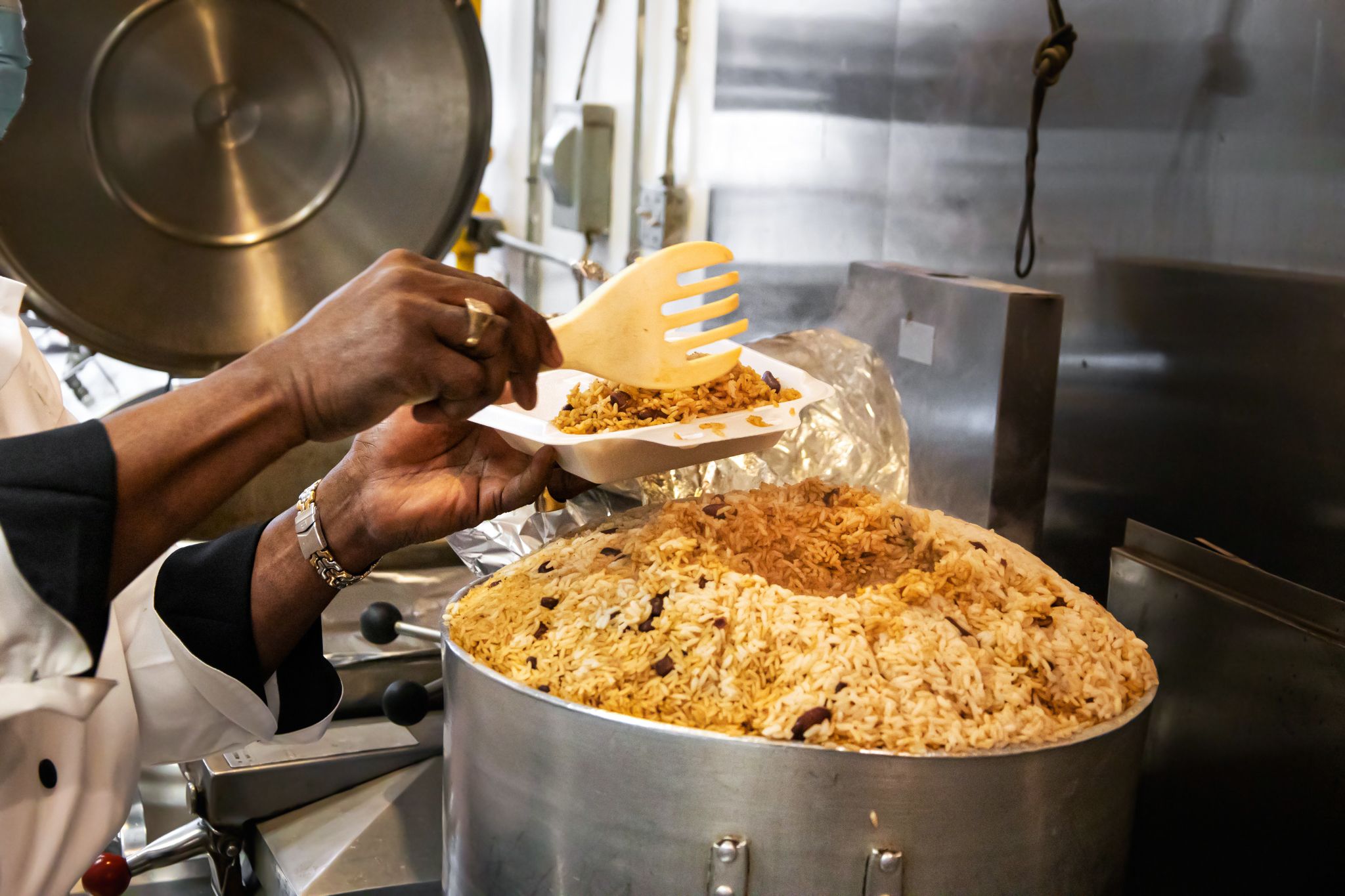 Our chef preparing authentic Jamaican food